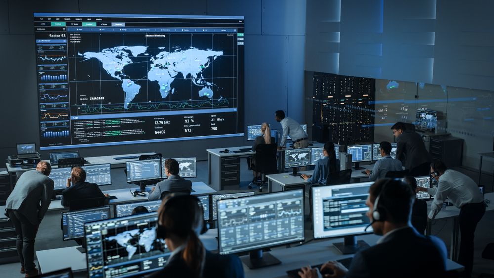 Global Monitoring Center With Diverse Team Analyzing Worldwide Data.