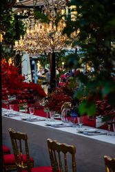 Elegant formal dinner table with autumn colors and chandelier
