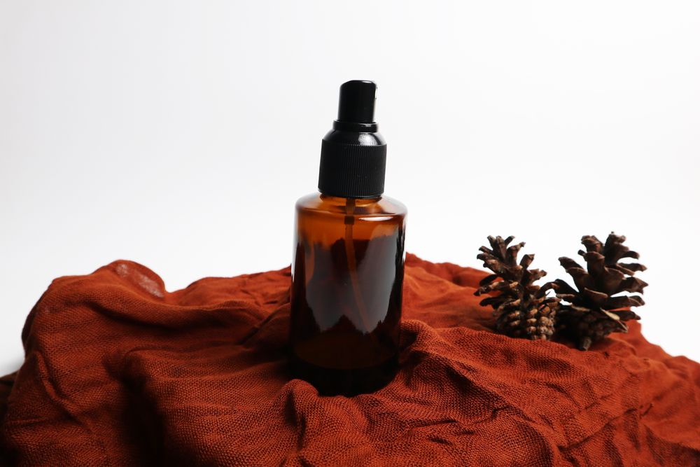 Amber bottle spray cosmetic for mockup