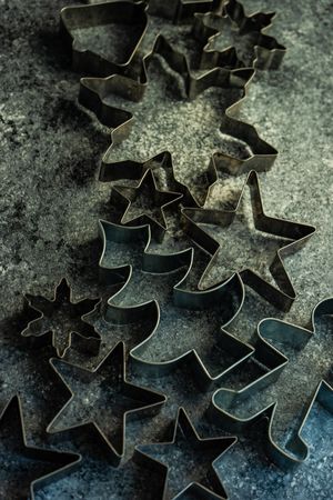 Close up of cookie cutters on table
