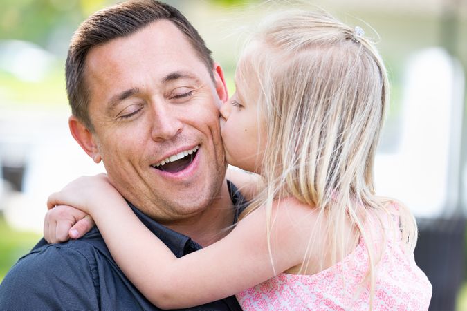 Young White Father and Daughter At The Park