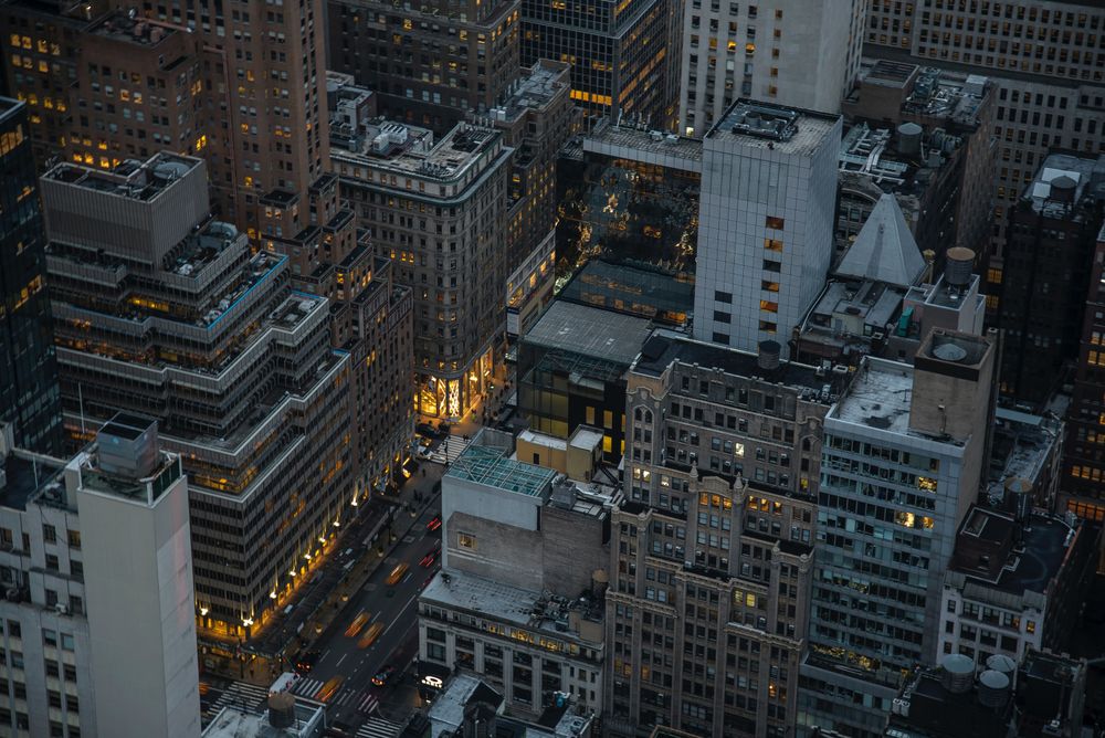 Aerial view of city buildings during evening