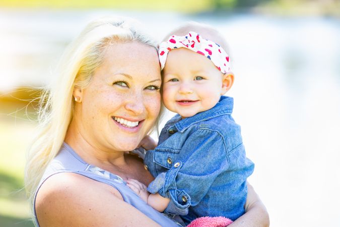Young Mother and Daughter At The Park