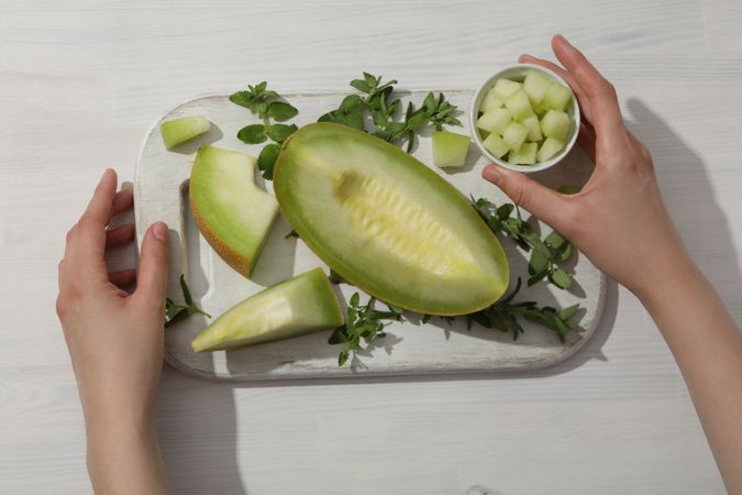 Cut fresh melon on a cutting board