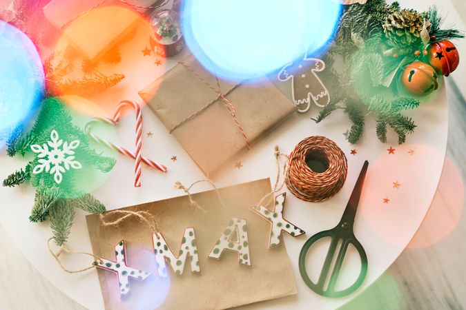 Christmas presents and decorations on table