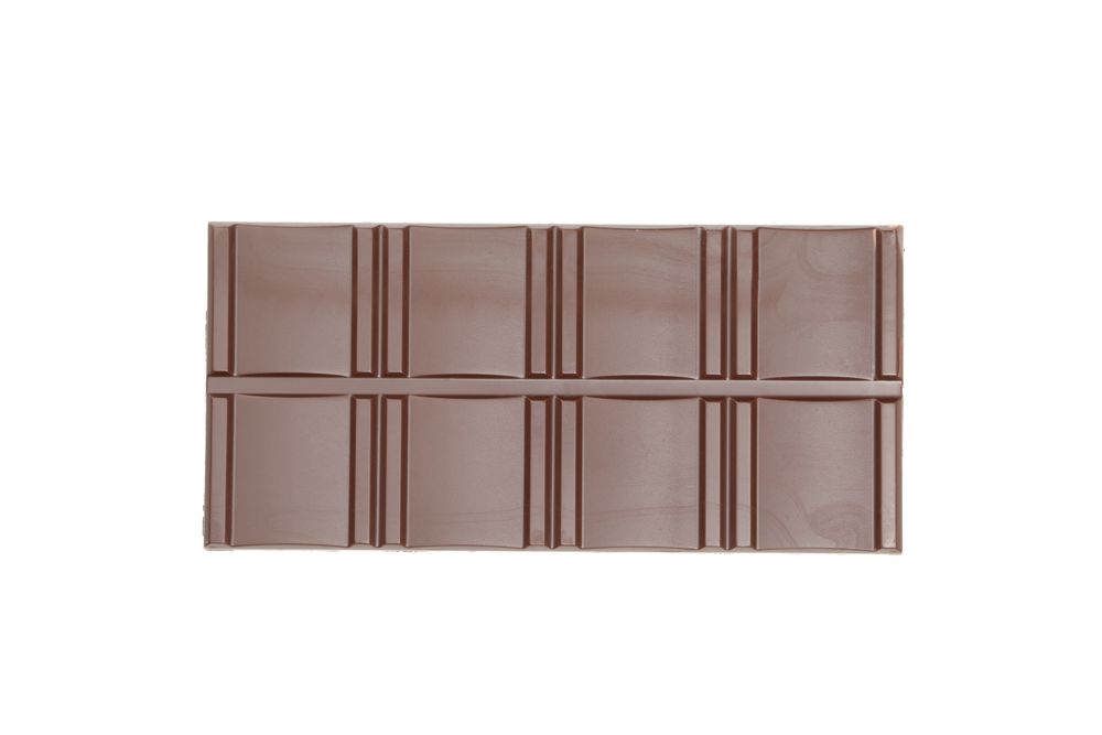 Tasty chocolate bar isolated on studio background