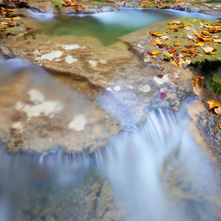Amazing waterfalls of aquifer with bright vegetation