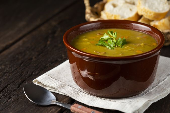 Pea soup. Bowl with pea soup on the table