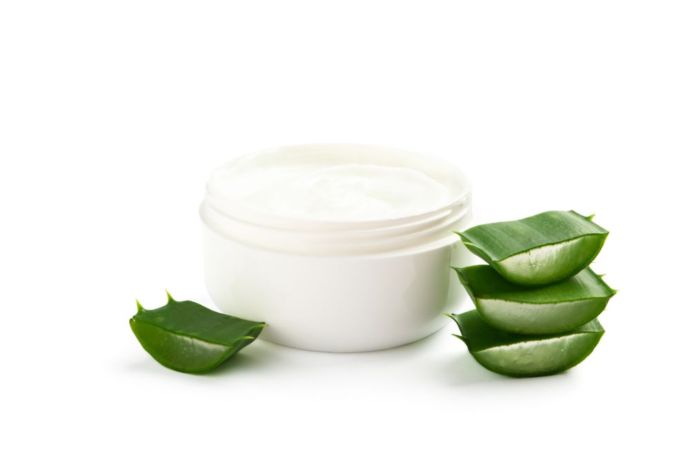 Composition with natural treatment accessories isolated on blank background. Aloe vera