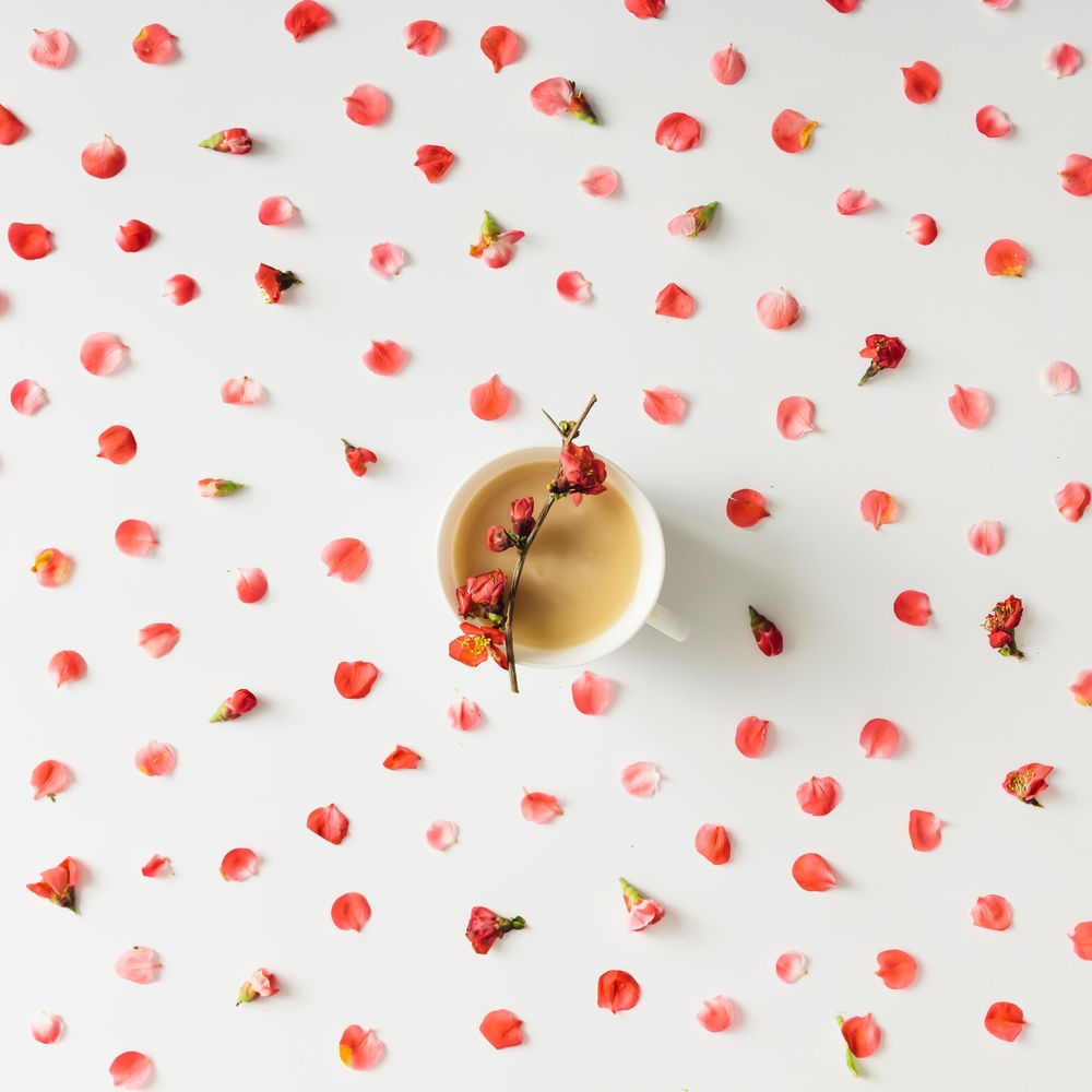 Colorful bright floral pattern with coffee or tea cup