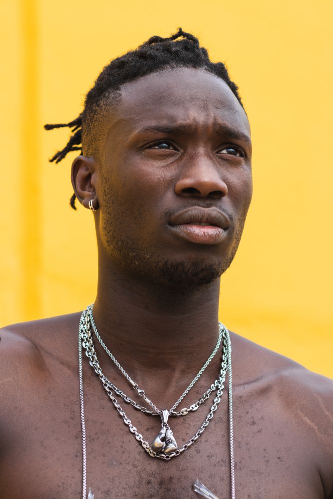 Stylish shirtless Black man