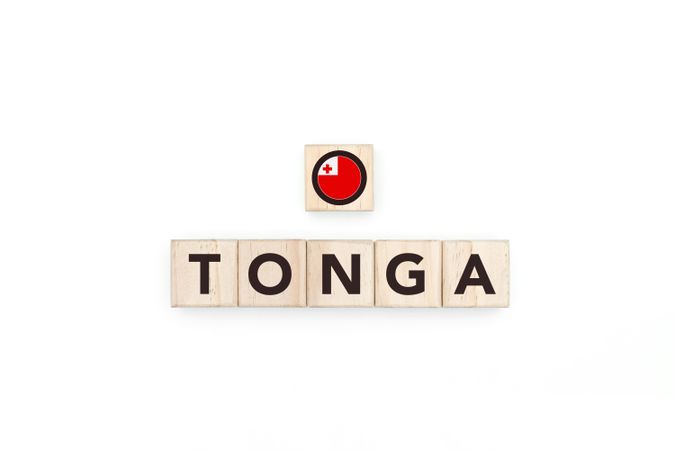 Wooden blocks bearing the name and flag of Tonga.