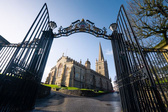 Entrance gates and cathedral on sunny spring day