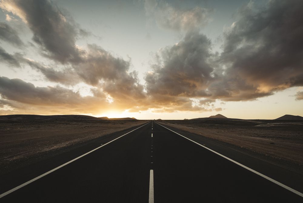Center of the road at sunset