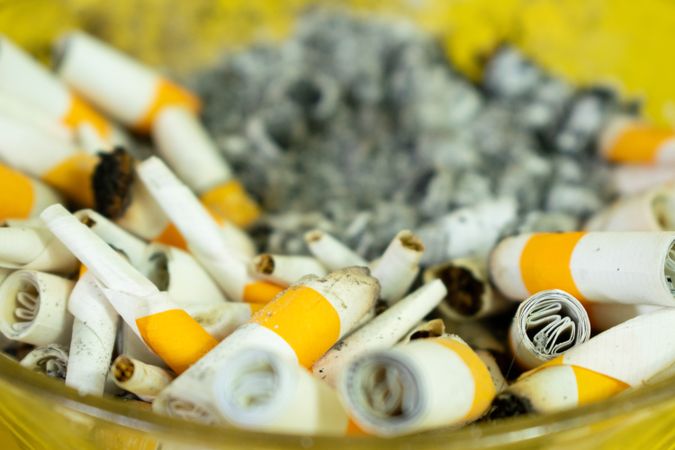 Close up of cigarette butts in ashtray