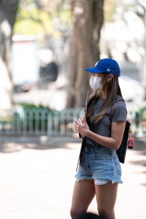 Los Angeles, CA, USA — June 16th, 2020: woman standing at protest against racial injustice