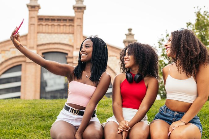 Young Friends Enjoying Summer Together and taking selfies