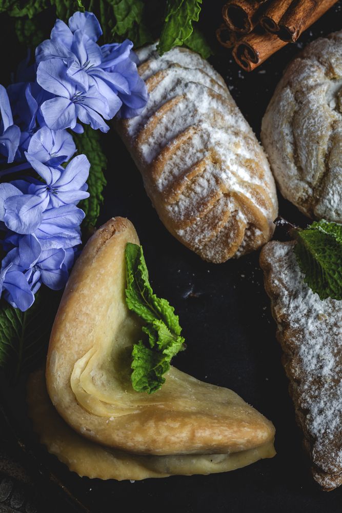 Traditional tea with mint and assorted Arab sweets