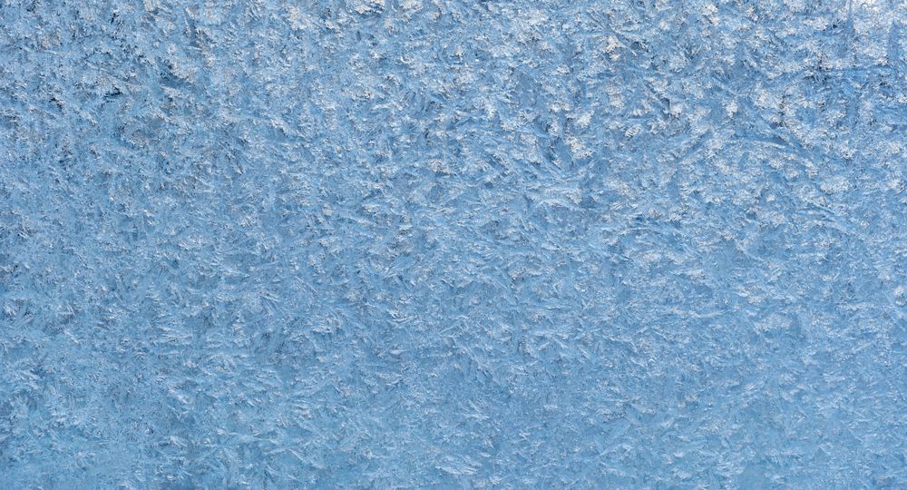 Ice frozen glass, close-up, full-frame background