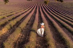 Woman standing in lavender field
