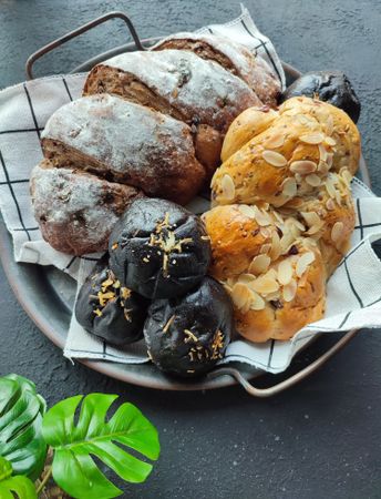 Freshly baked assorted bread on a tray