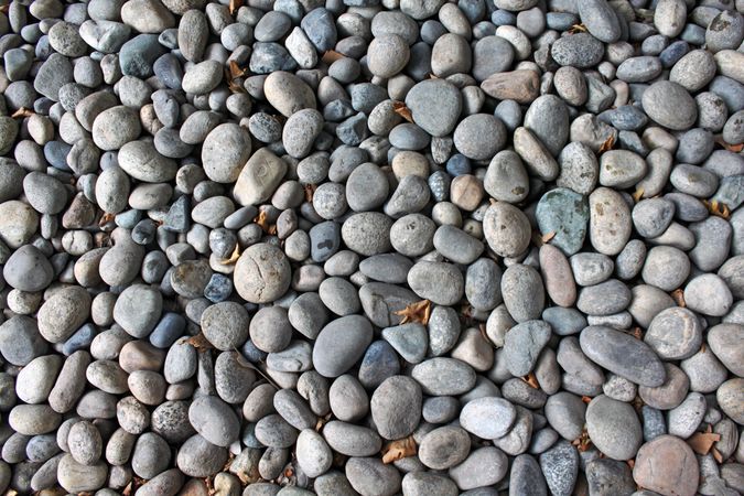 Close up top view of rounded grey stones