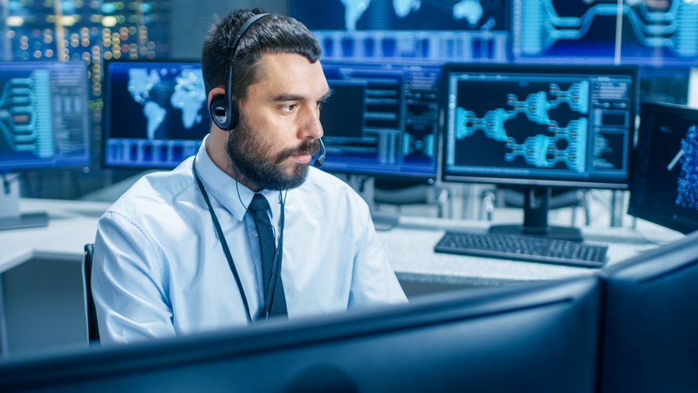 In the System Monitoring Room Dispatcher Wearing Headset Observers Proper Functioning of the Facility.