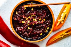 Traditional Georgian sauce Adjika with spicy peppers