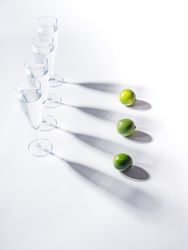 Creative composition of citrus and glasses of water