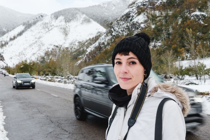 Woman visiting mountains in winter