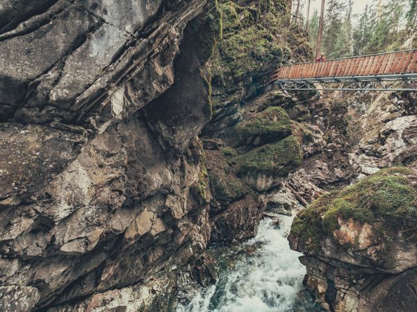 Bridge of tourist path among beautiful mountains