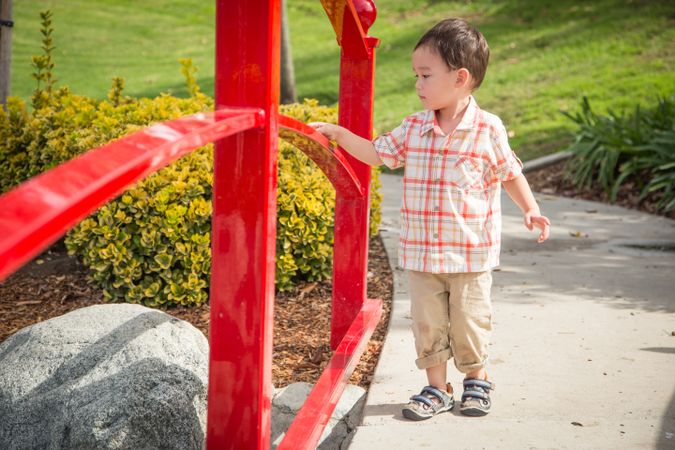 Young Boy Walking at the Park.