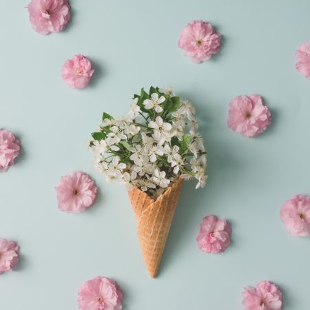 Ice cream cone with flowers and leaves