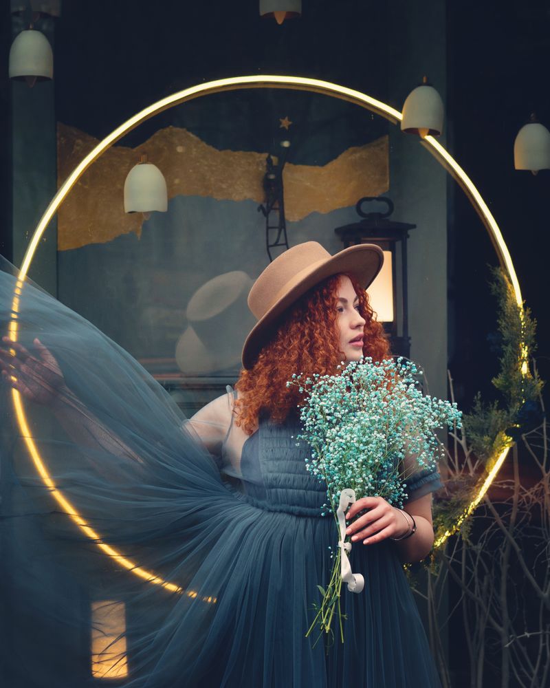 Street portrait of female in hat