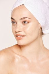 female with radiant body after cosmetic procedure