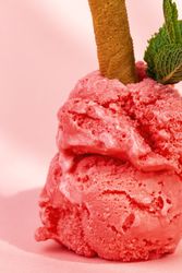 Strawberry ice cream scoops with waffle stick