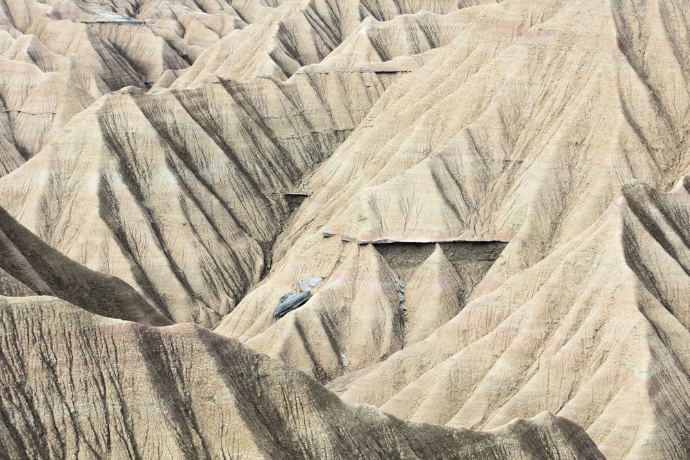 Rock mountain on desert land
