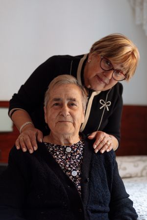 mature woman served by her daughter