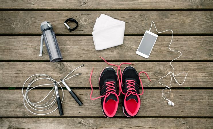Set of sports equipment with sneakers