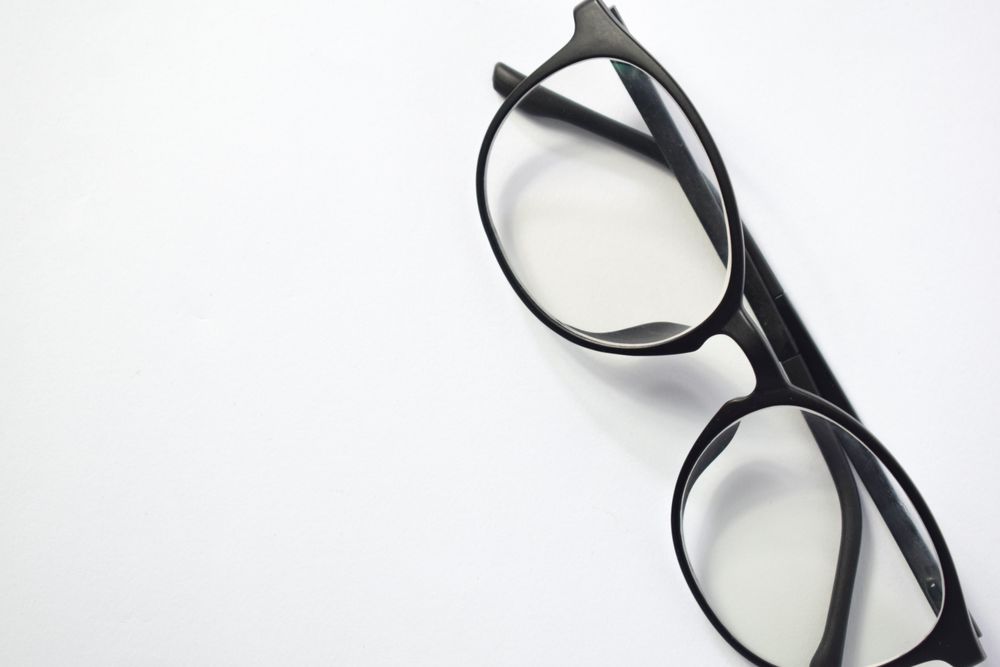 Glasses on blank background with copy space