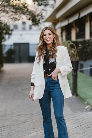 Charming woman posing on street