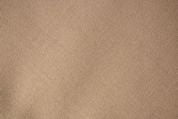 Detailed flat view Light brown pattern fabric texture background.