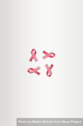 Four pink ribbons on plain background 41rMjb