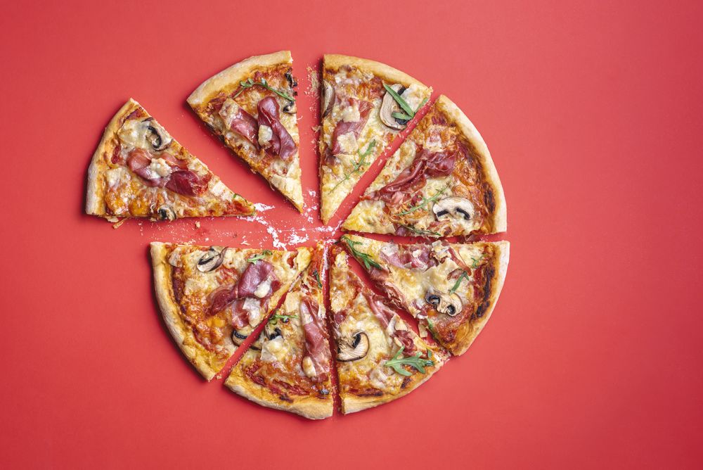 Cut and sliced prosciutto  pizza