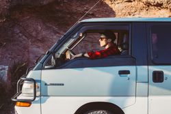 Man in driver’s seat of van