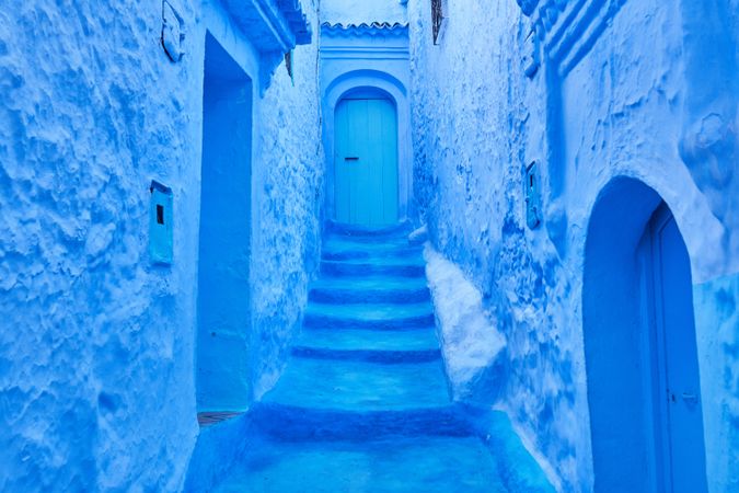 Narrow way to door between old buildings
