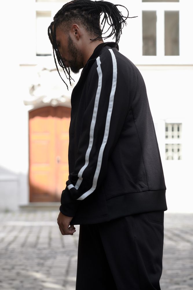 Black male standing on the street