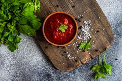 Traditional Georgian sauce on board - satsebeli