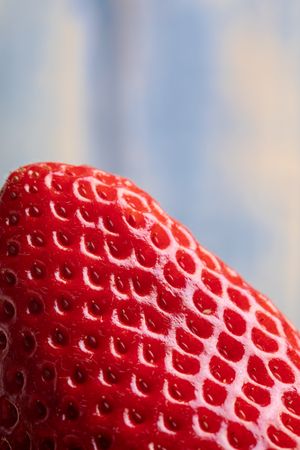 Close-up of fresh strawberry on desk