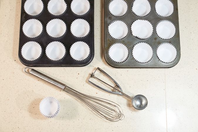 Cupcake baking pans near tools